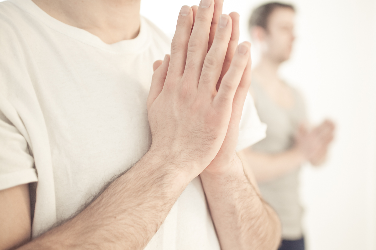 Men doing yoga